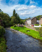 A stream running through a small village.