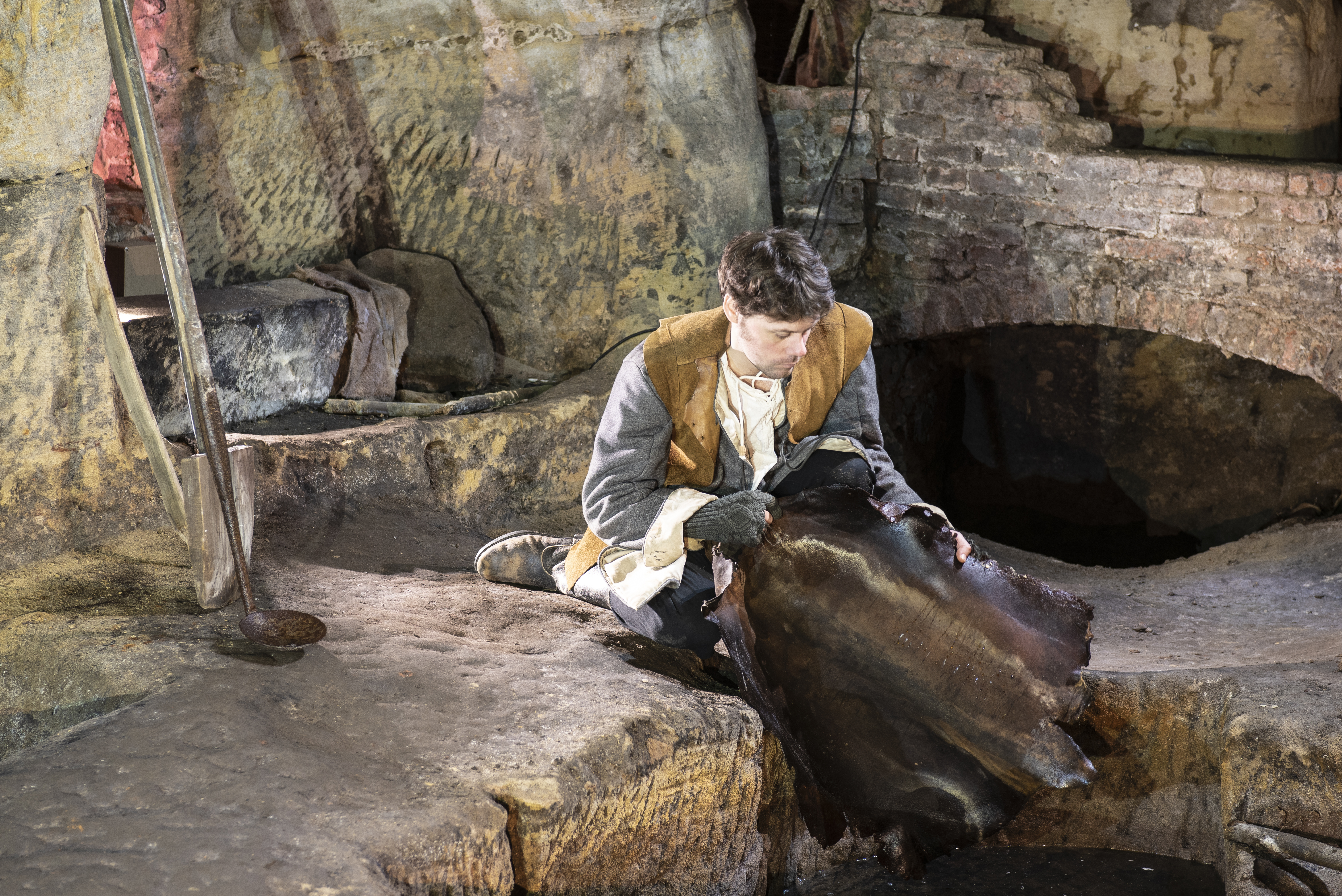 An actor putting on a performance at Nottingham City of Caves.