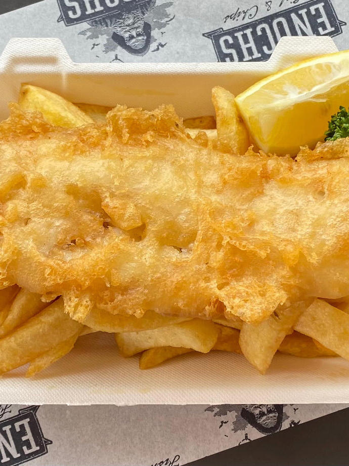 Fish and chips being served at Enochs Fish &amp; Chips in Snowdonia/Eryri National Park