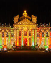 Festive Christmas lights shining onto Blenheim Palace