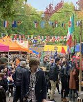 Crowds of people shopping at Gloucester Green Market in Oxford