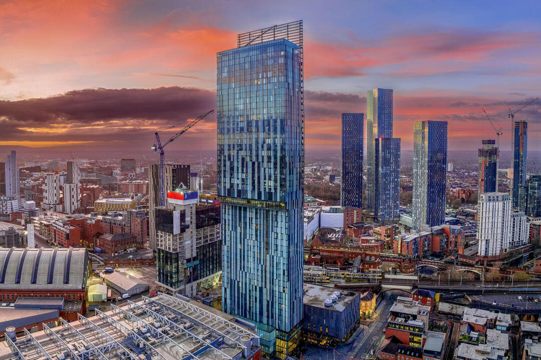 Aerial night view of high rise buildings in a large city