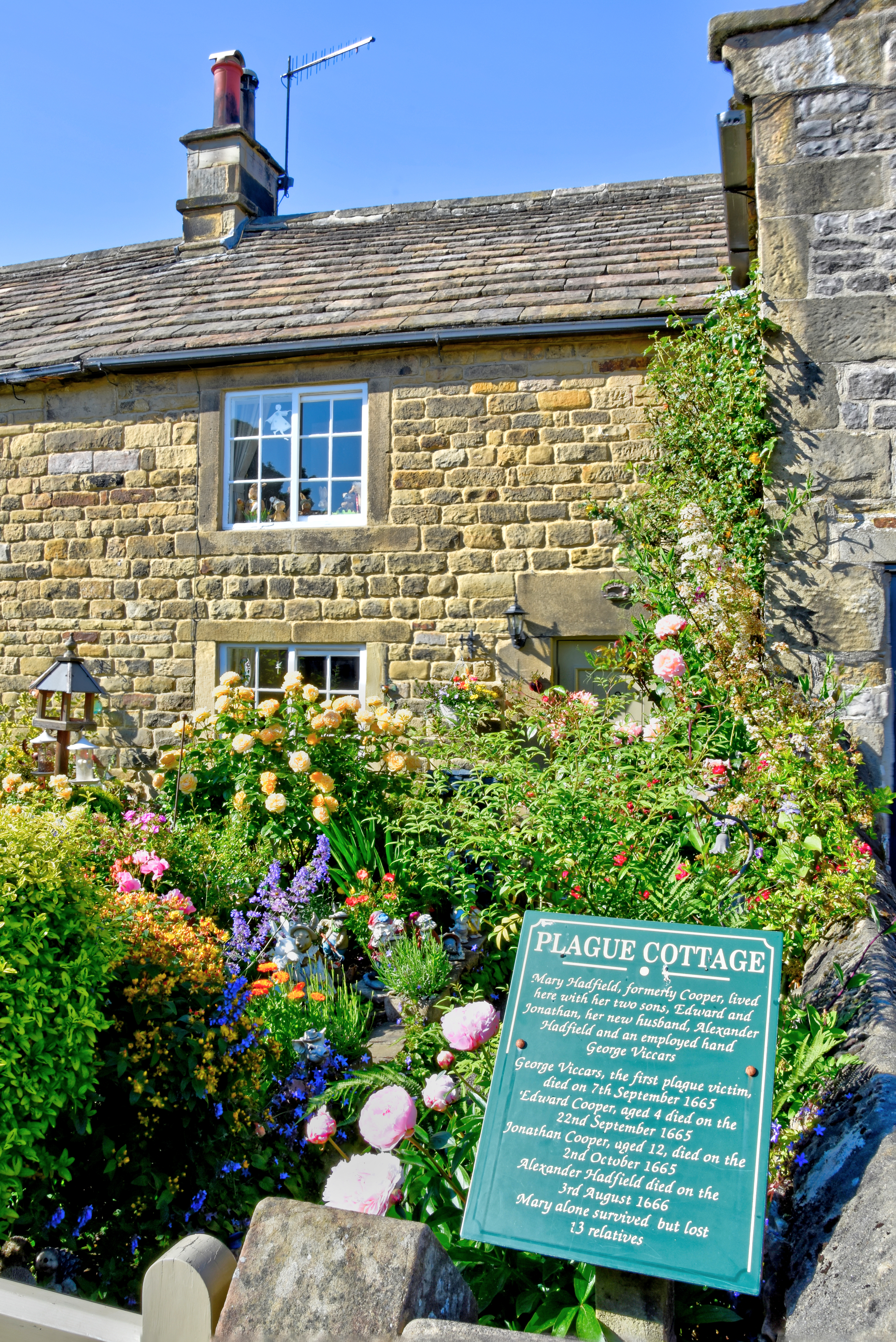 A stone cottage in the countryside.