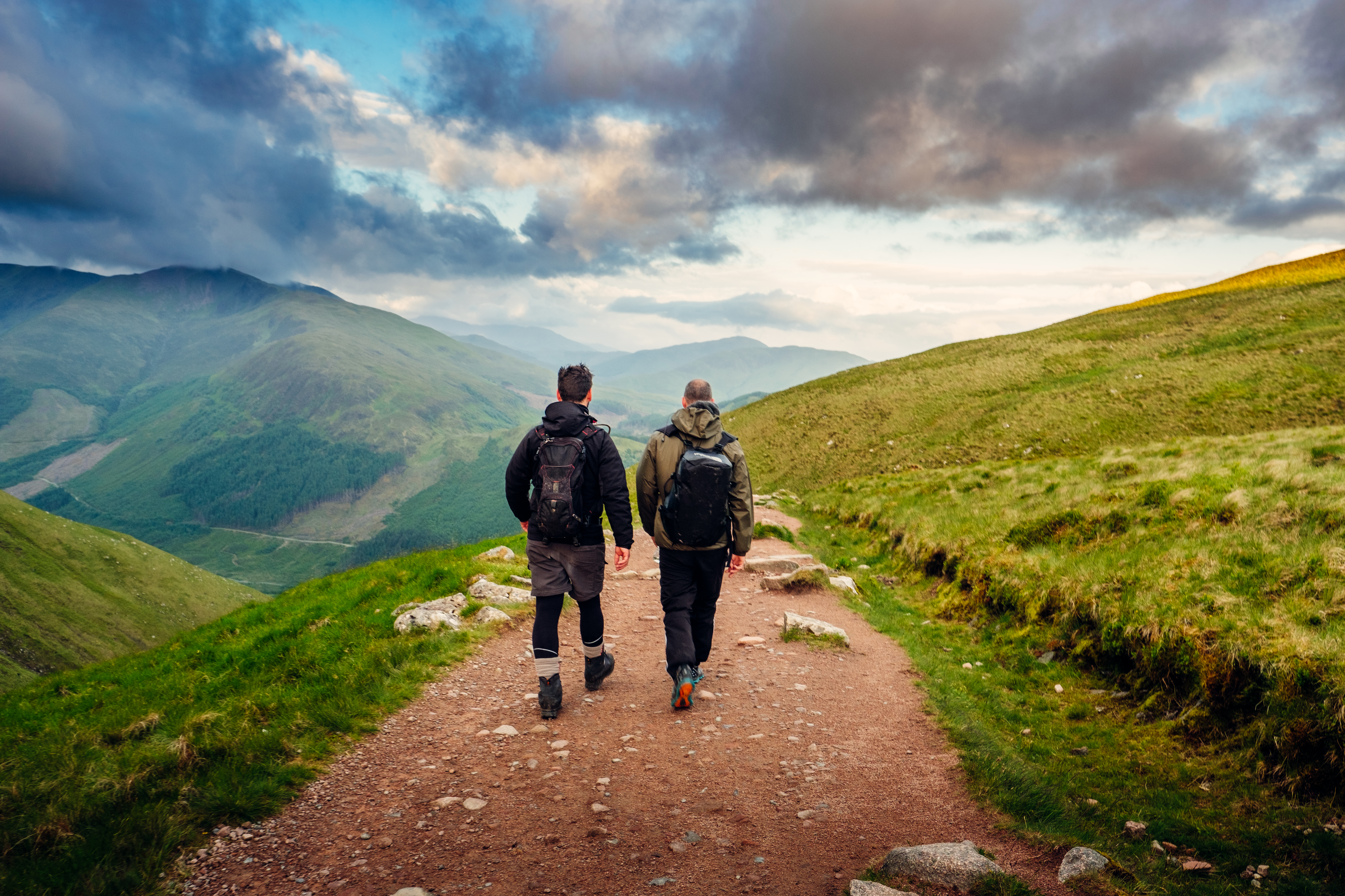 Two men hiking on Ben Nevis in the summertime