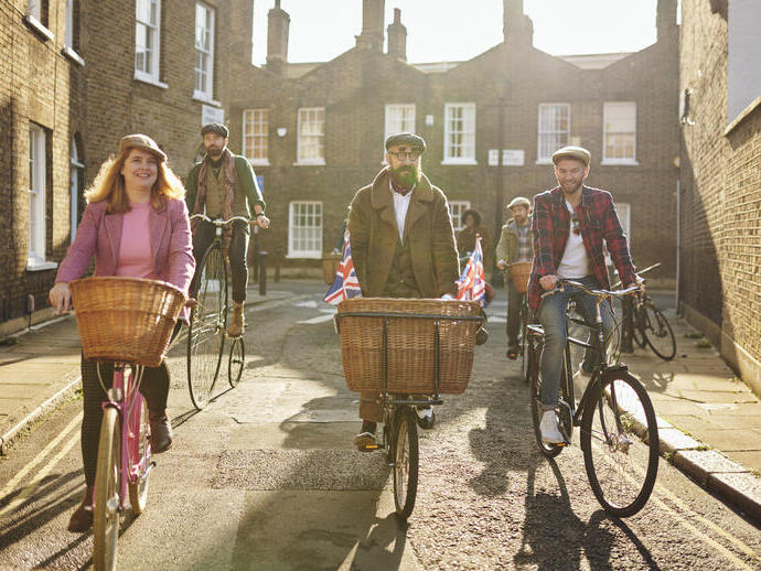 Tally Ho! Gin Safari experience tour guides and tourists cycling around London