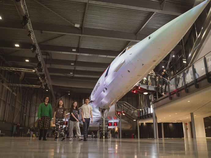 A family explore an Aerospace museum