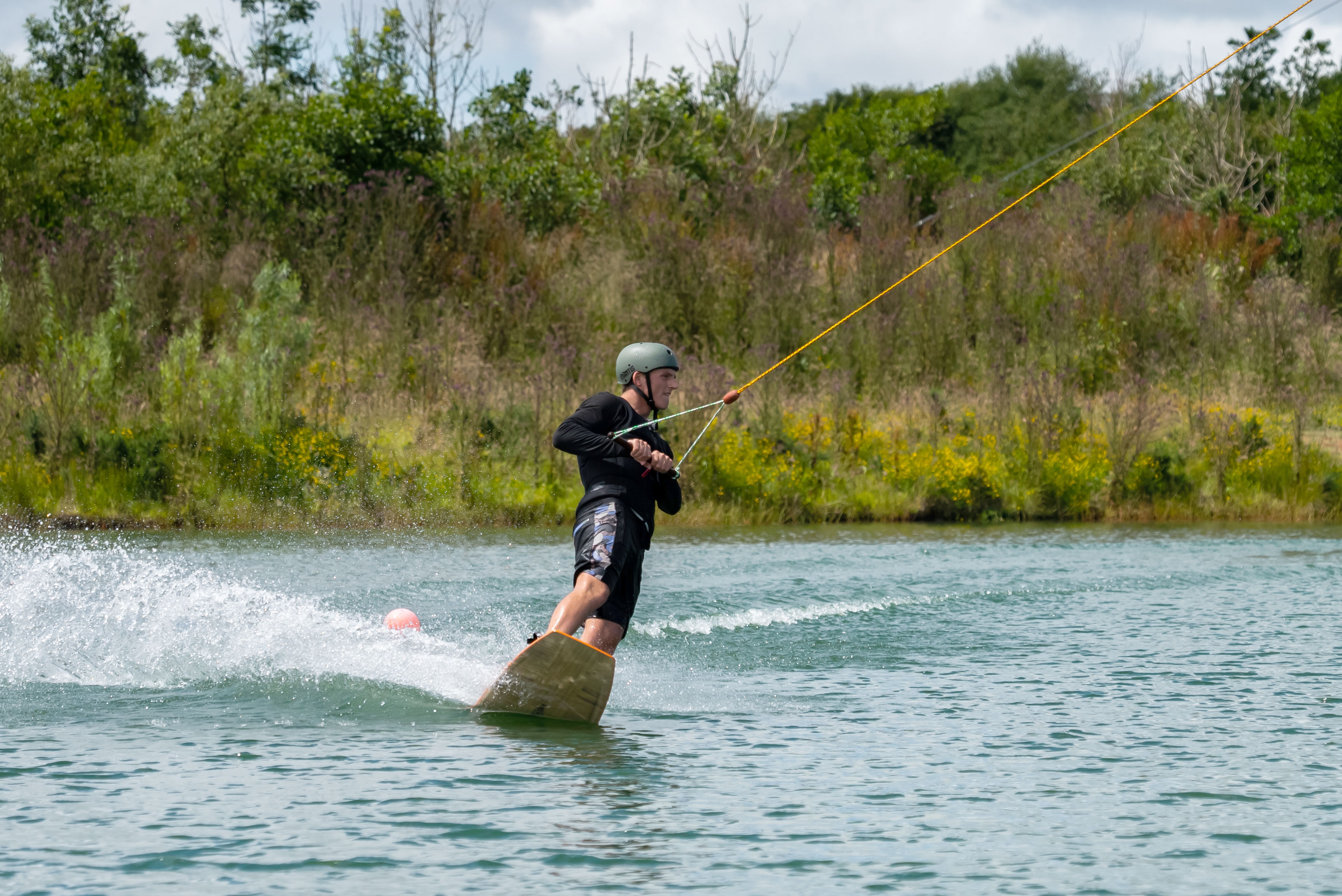 A man wakeboarding at North Devon Wake Park
