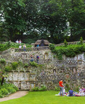 Groups of people exploring the plantation gardens in Norwich