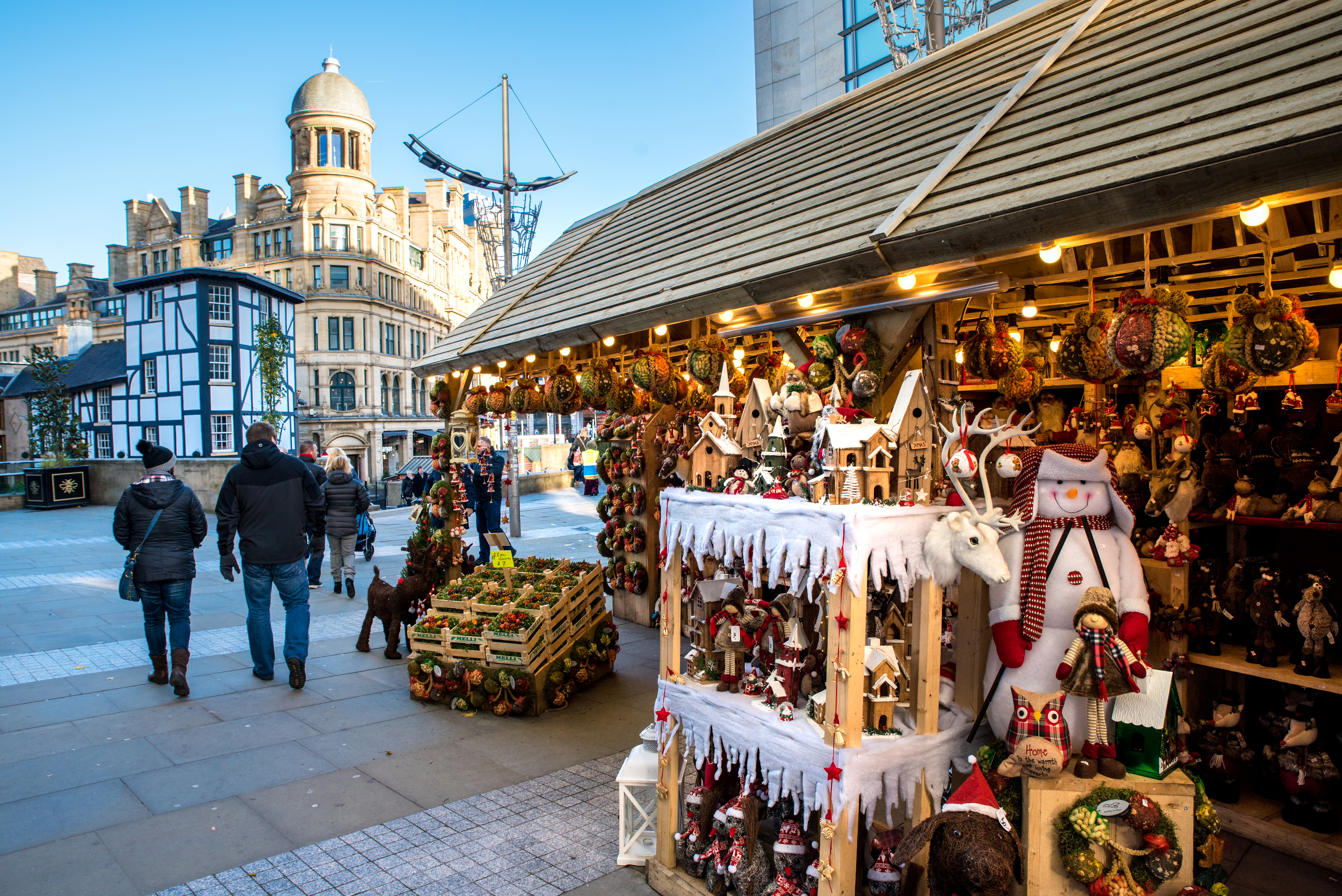 Christmas market stalls lining Cathedral Street in Manchester