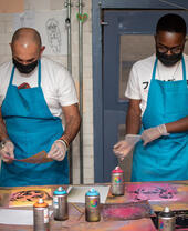A group of people on a grafitti course in Bristol