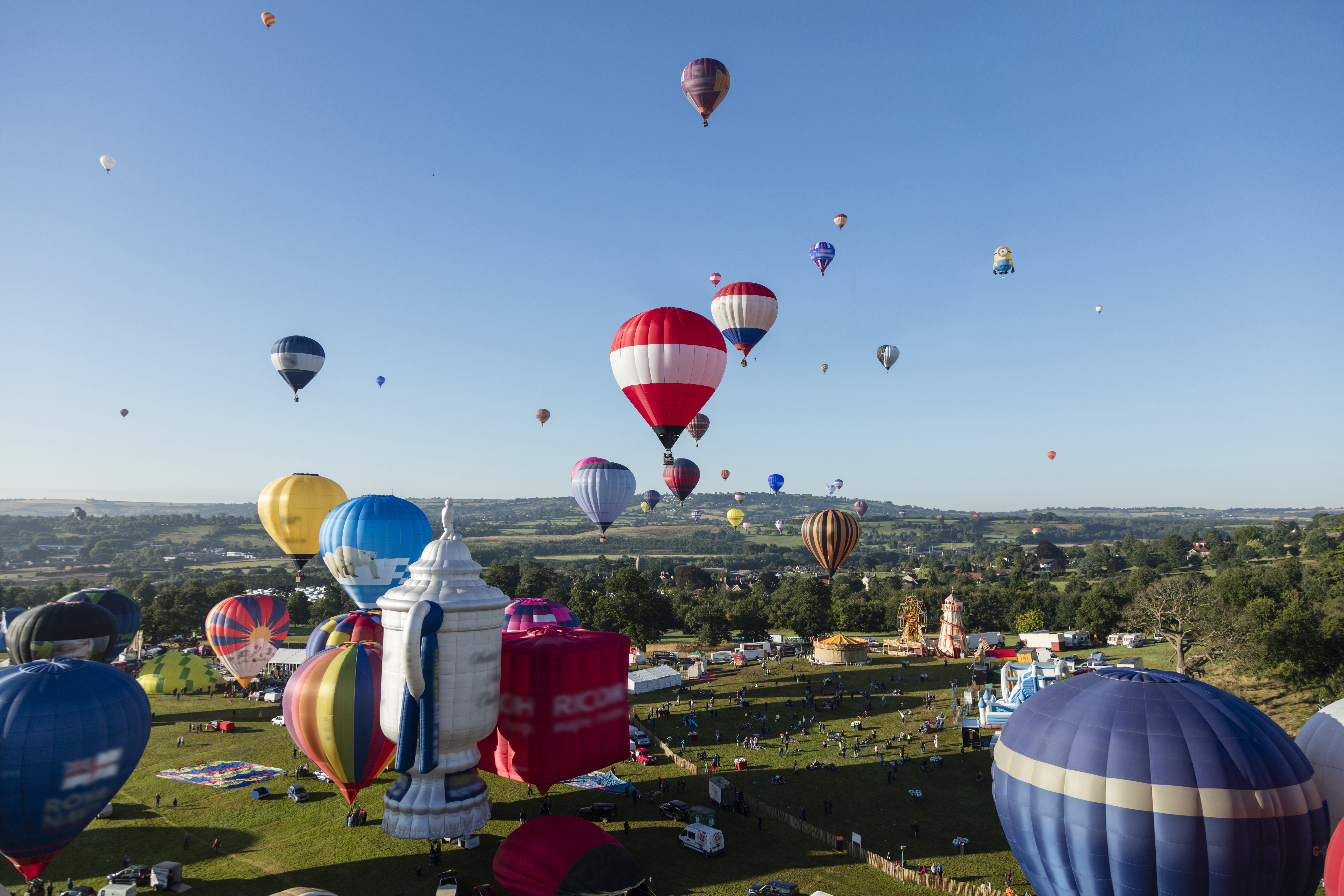 Hot air balloons rising into the skies over Bristol, International Balloon Fiesta
