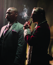 Two actors mid-performance of the Great Murder Mystery at The Lost Estate in London