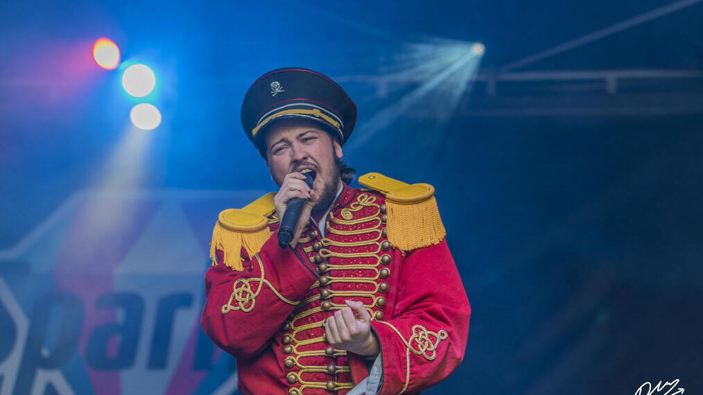 A performer on stage during Manchester's Sparkle Weekend event