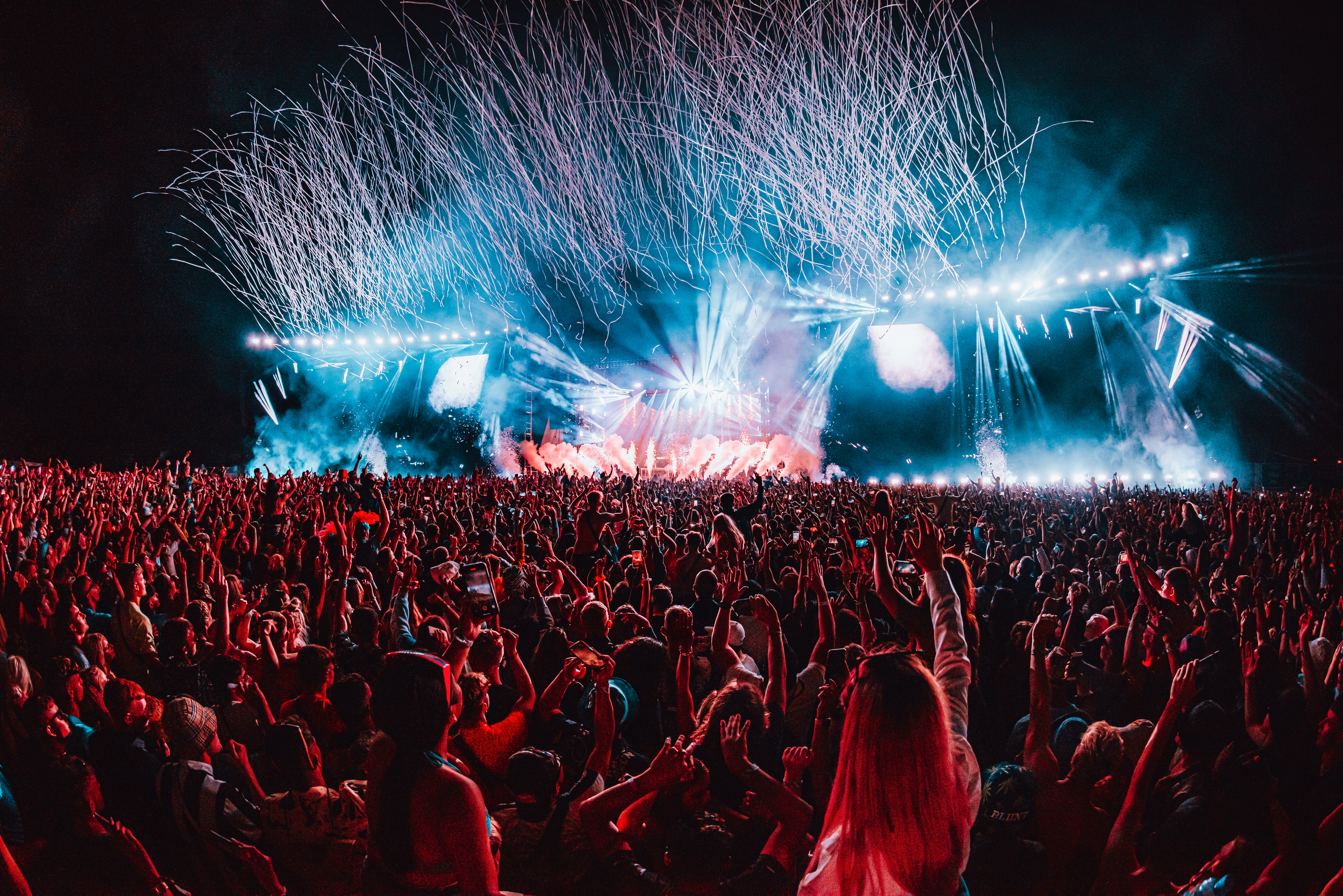 Crowd in front of the main stage at a music festival