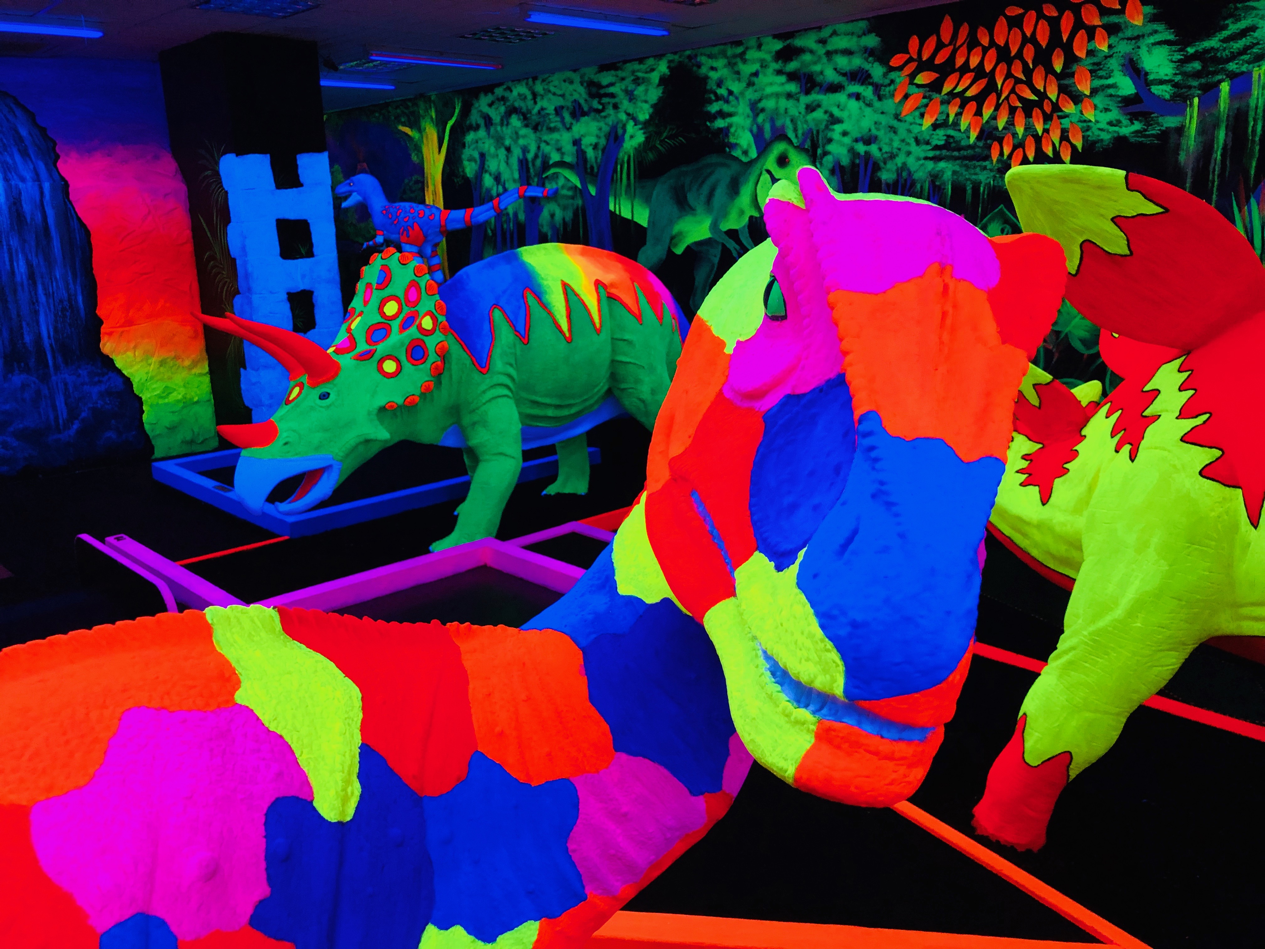 Luminescent decorations on a mini golf course at Globalls in Brighton