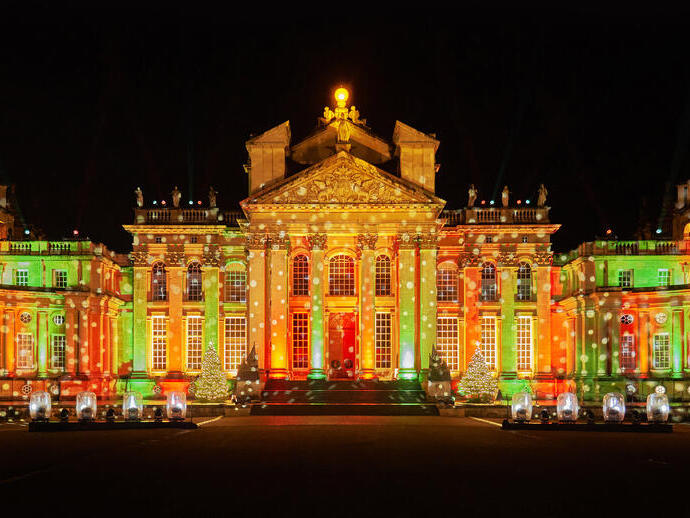 Festive Christmas lights shining onto Blenheim Palace