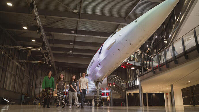 A family explore an Aerospace museum