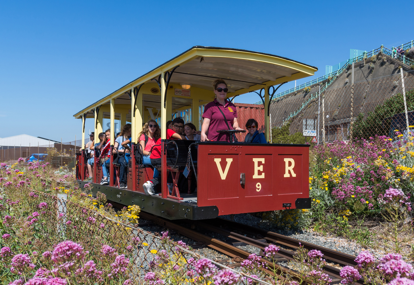train with people on board, in the summer
