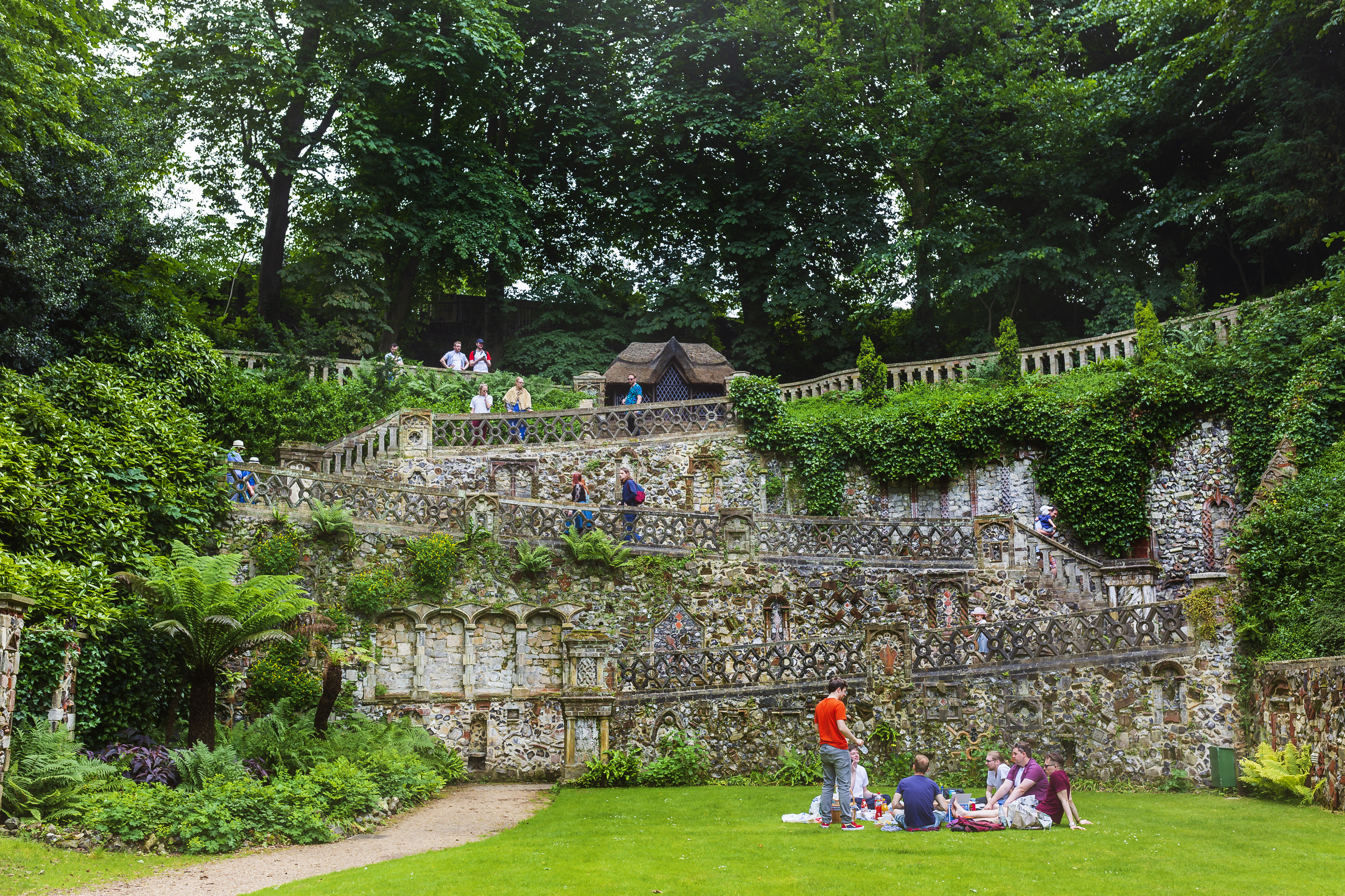Groups of people exploring the plantation gardens in Norwich