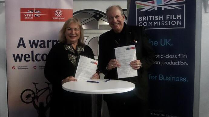 VisitBritain CEO Patricia Yates and Adrian Wootton OBE, Chief Executive of the British Film Commission sign a Memorandum of Understanding at FOCUS London