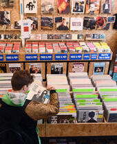 A man looks through records at Spillers Records in Cardiff