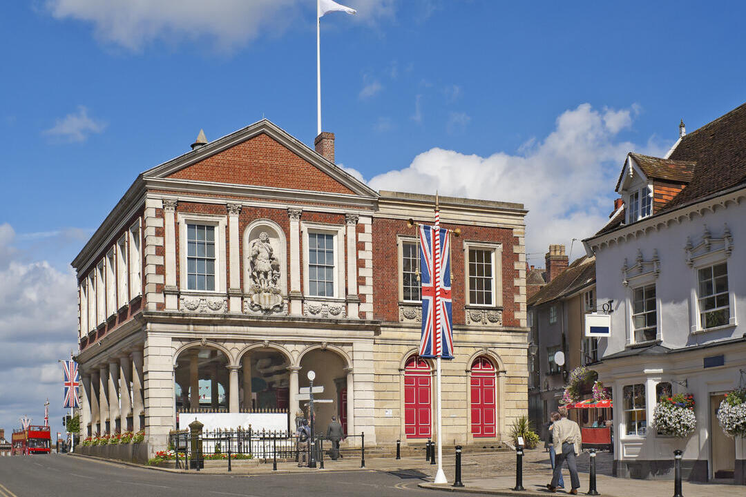 People walking along a street in a town