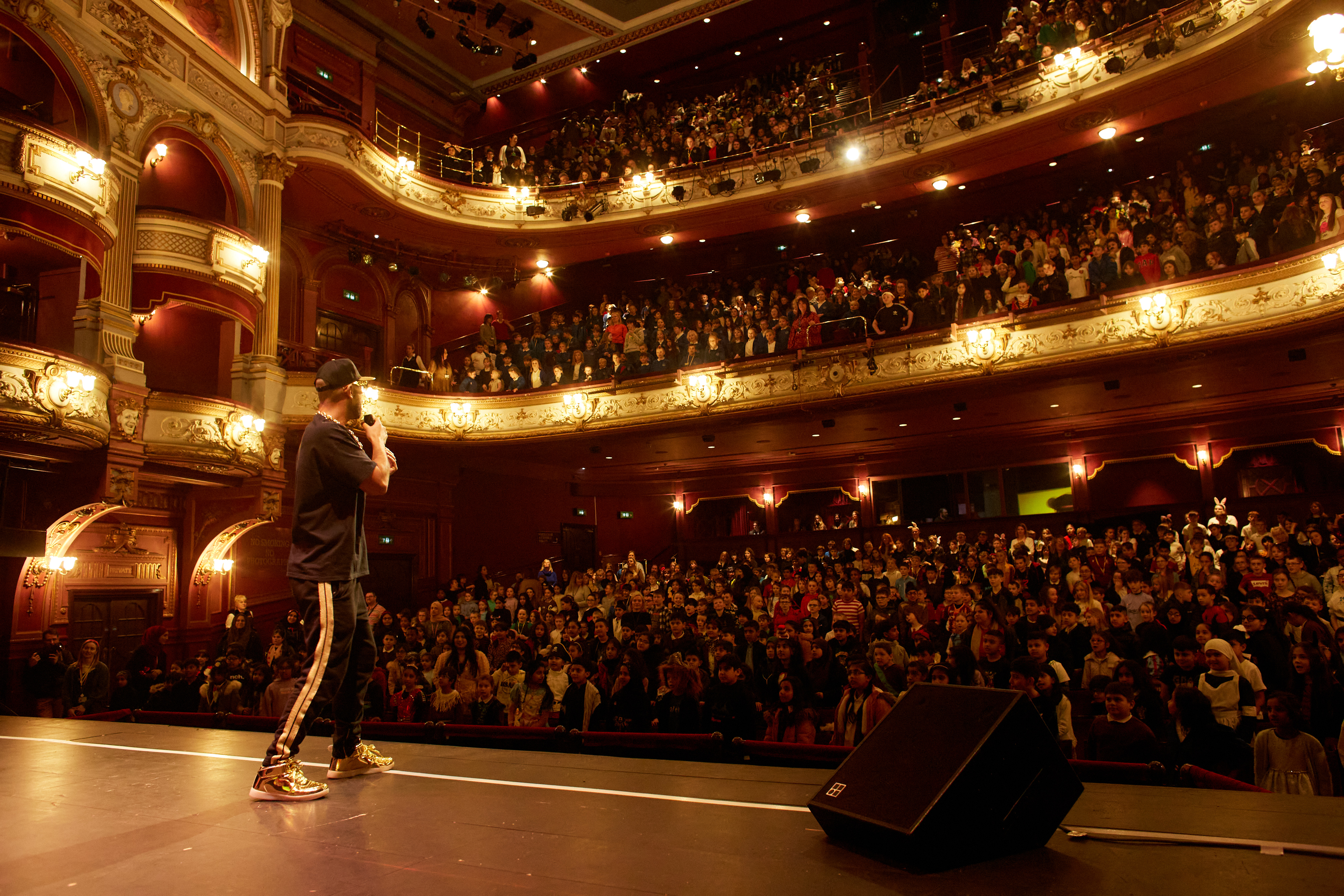 A performer on stage at Bradford Literature Festival
