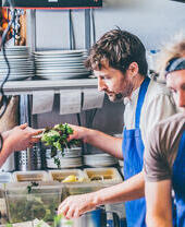 Cooks working in a restaurant kitchen