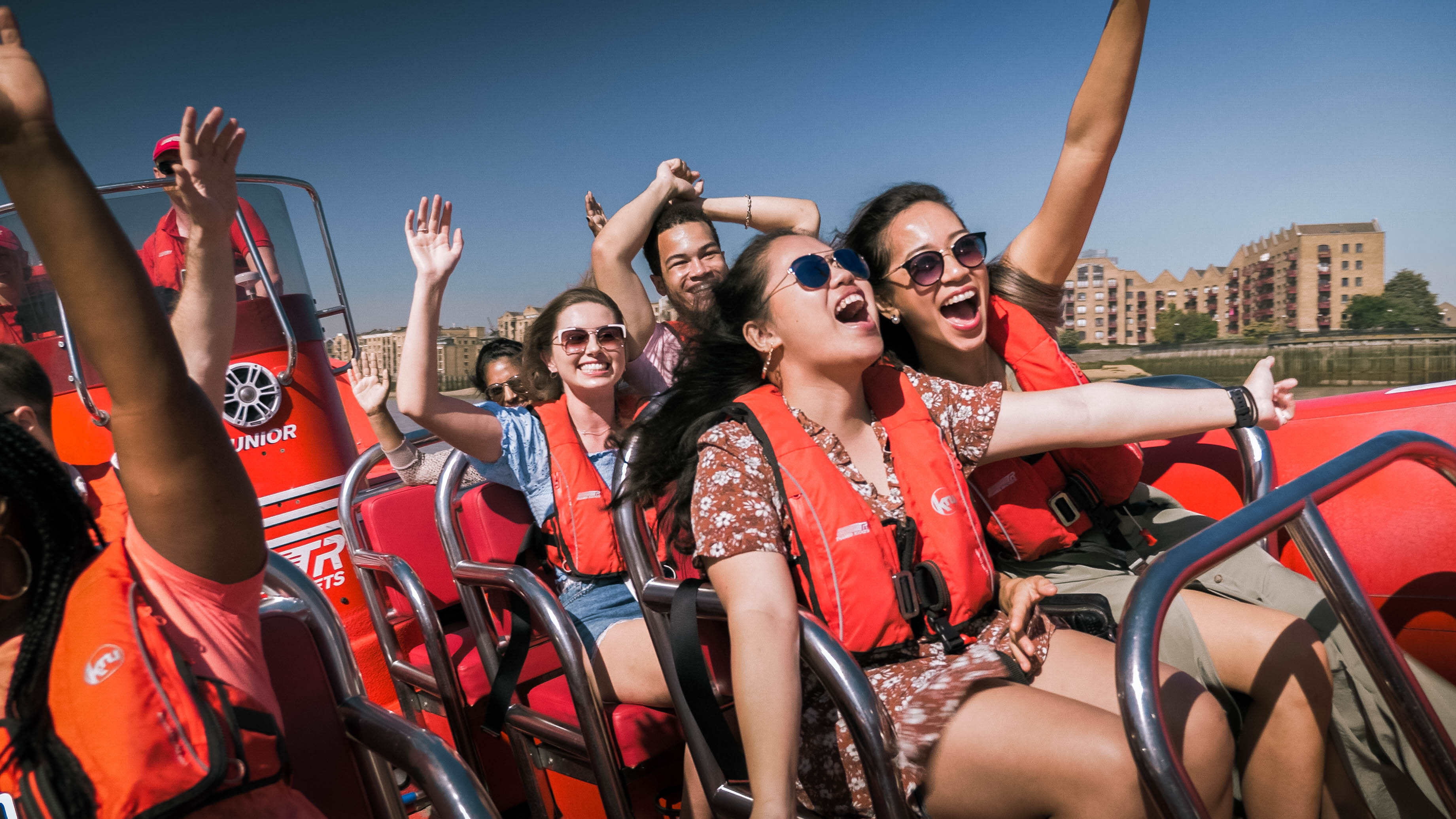 Screaming passengers on a Thames Rocket speed boat