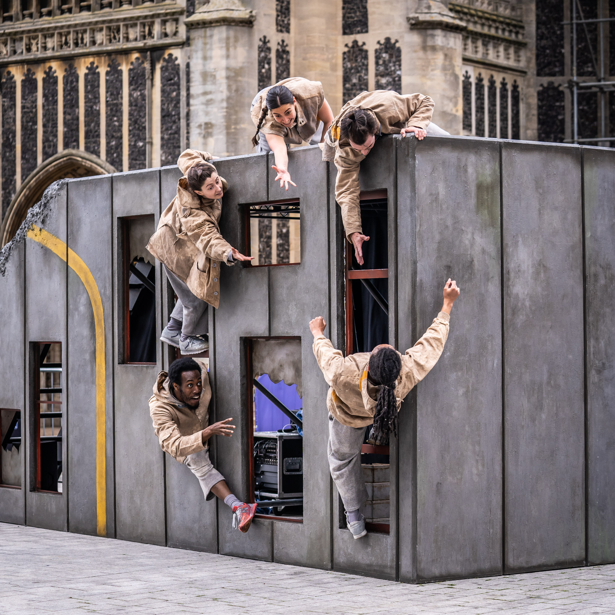 A group of performers putting on a display outside as part of Norfolk and Norwich Festival