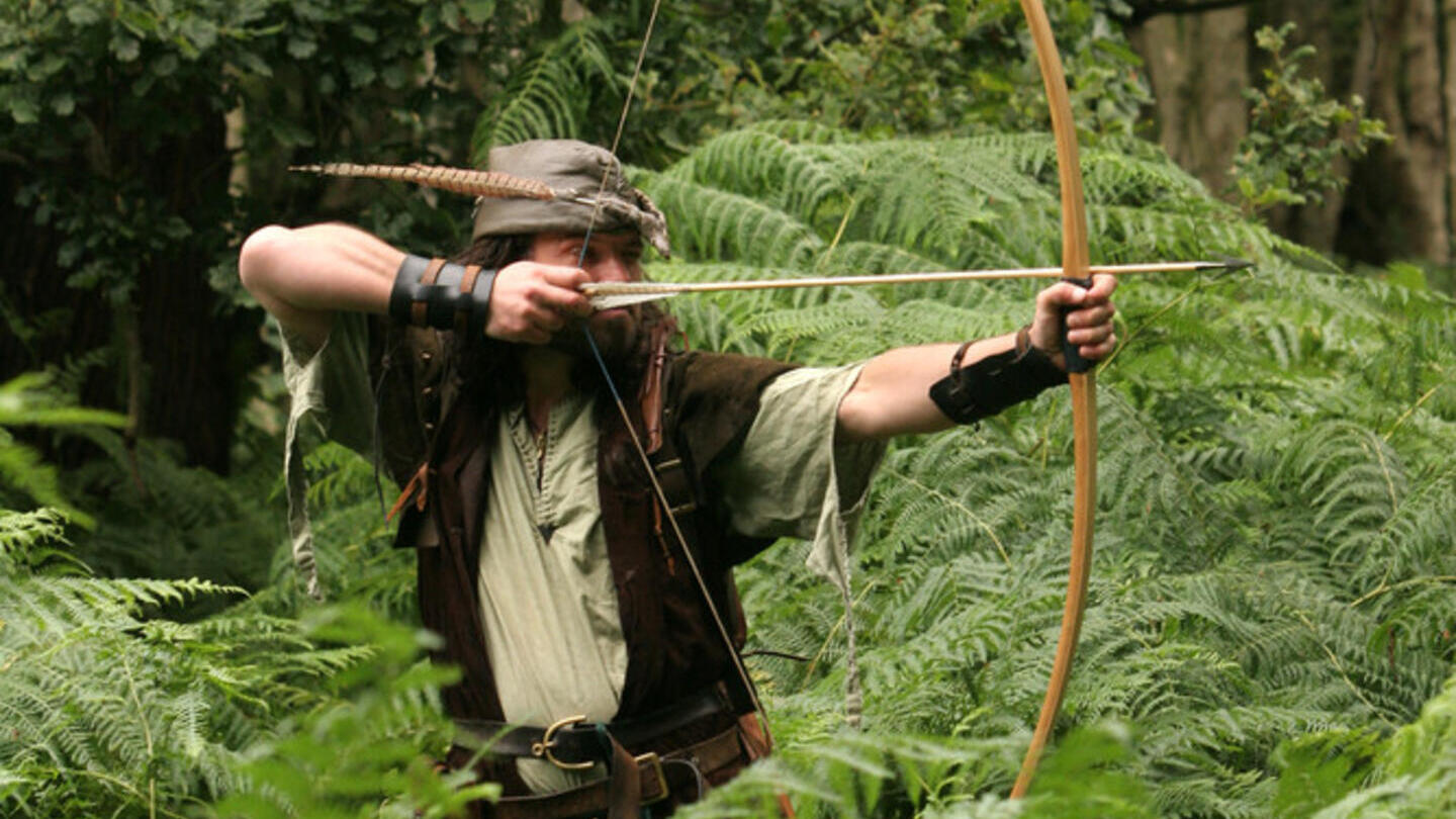 Man dressed up as Robin Hood in Sherwood Forest