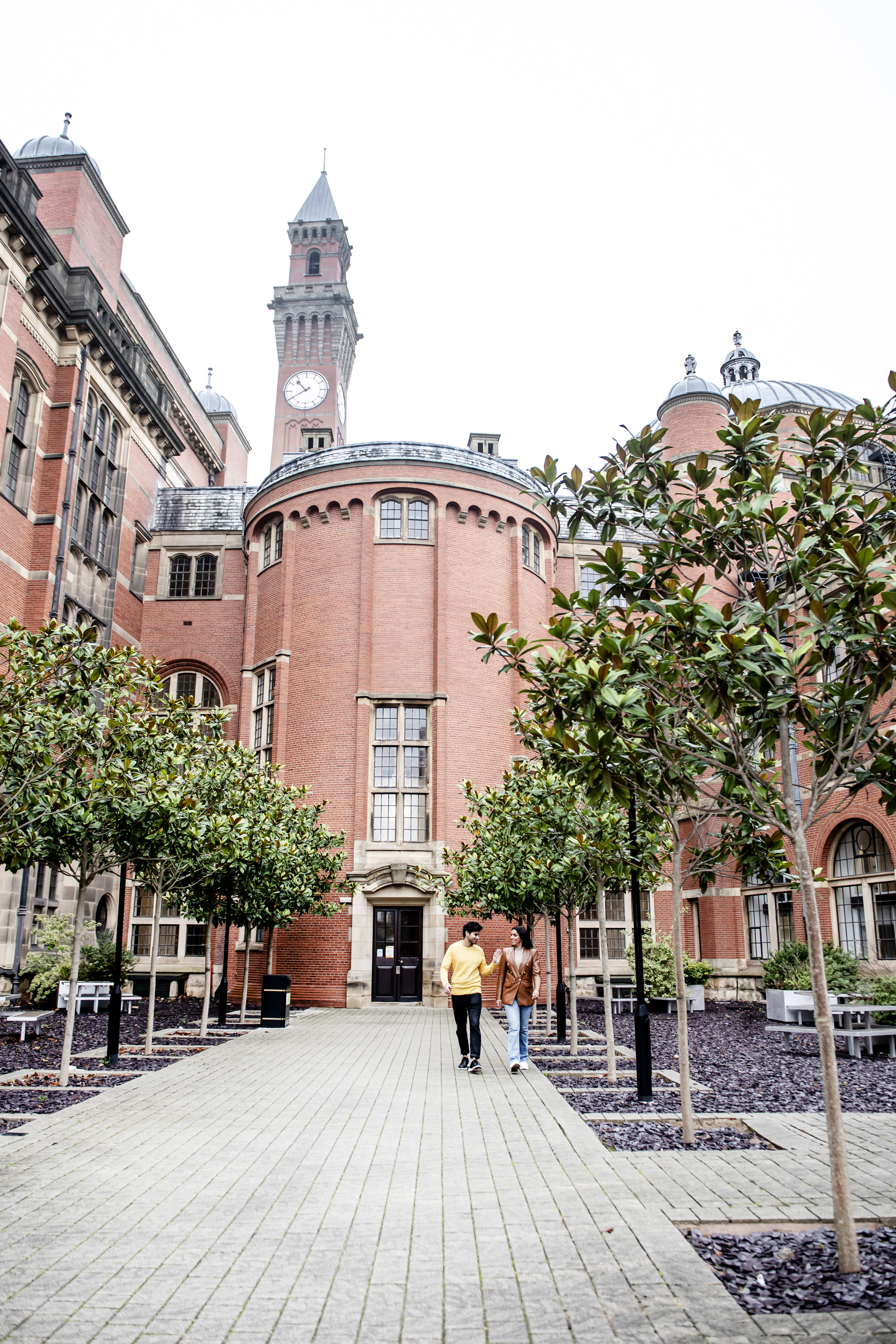 Couple strolling through the grounds of University of Birmingham