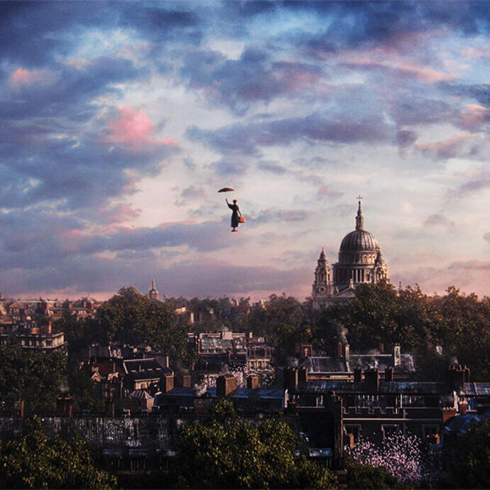 Person with umbrella floats above a city skyline at sunset, St Paul's Cathedral visible among rooftops and trees.