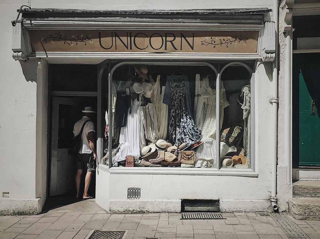 Man walking into a boutique style vintage shop