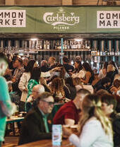 Visitors in the bar at Common Market, Belfast