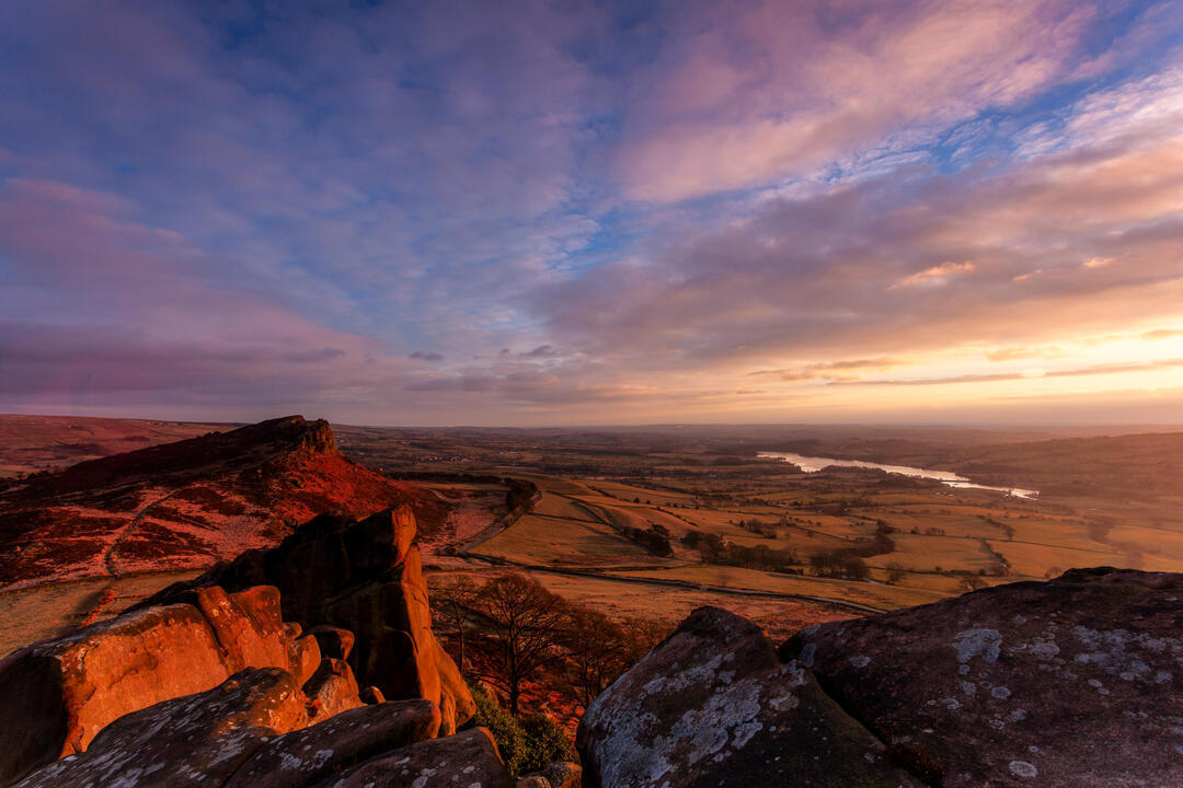 Hen Cloud and Tittesworth Reservoir from the Roaches at sunset. Peak District sandstone and the Staffordshire moorlands.