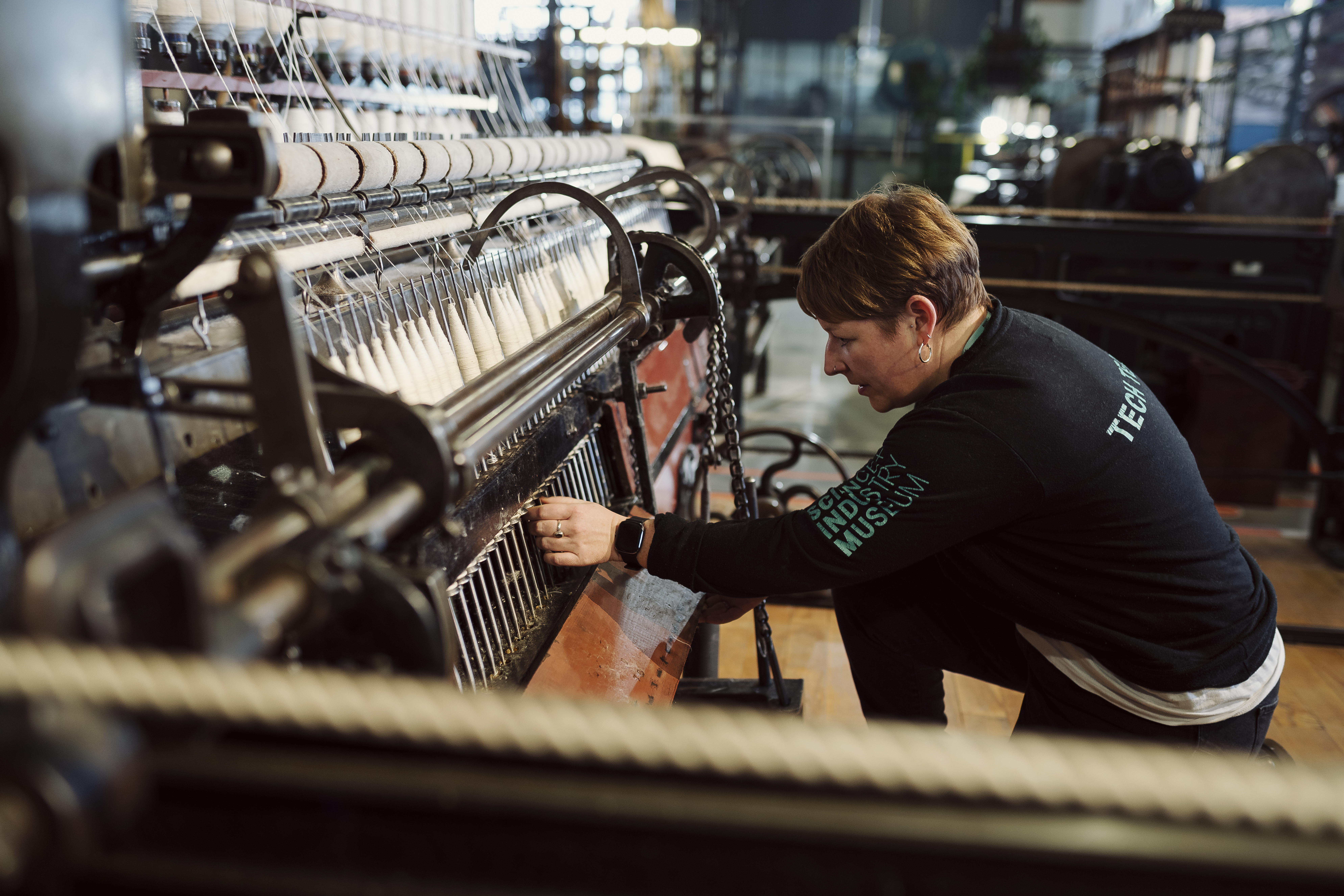 A technician preparing an exhibit at Manchester's Science Museum