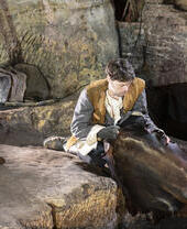 An actor putting on a performance at Nottingham City of Caves.