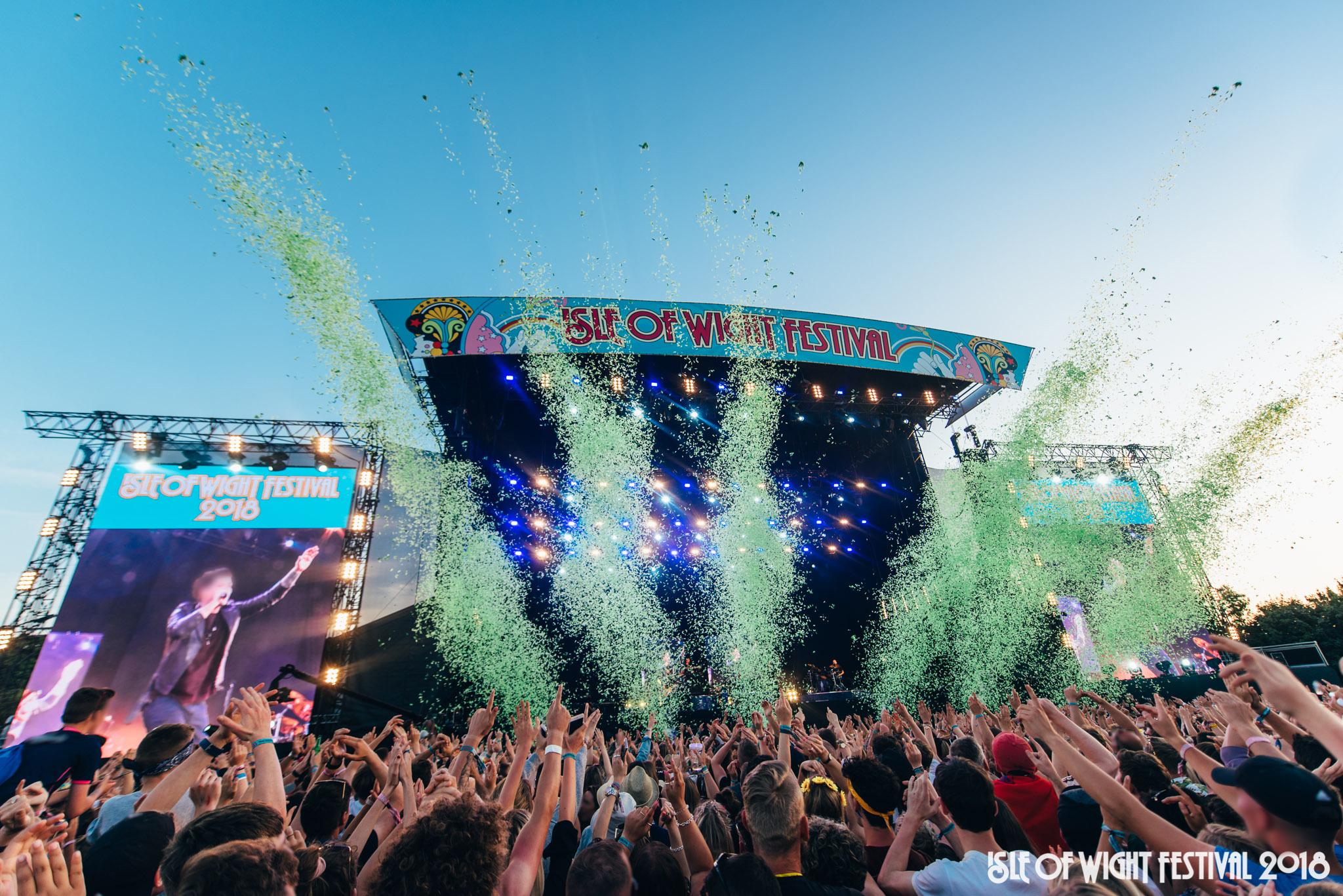 Crowd in front of the main stage at a music festival