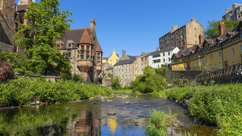 Stream surrounded by period buildings in a city centre