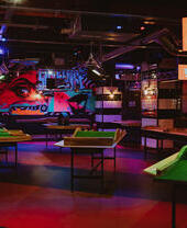 A row of Crazy Pool tables in Roxy Ballroom in Birmingham, a mash-up of crazy golf and pool