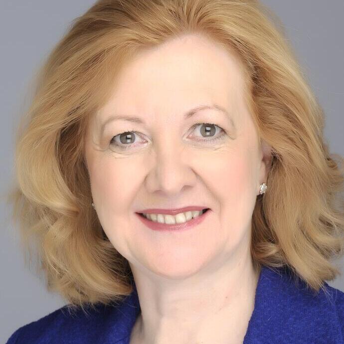 Victoria-Borwick-mid-blue-suit-sm