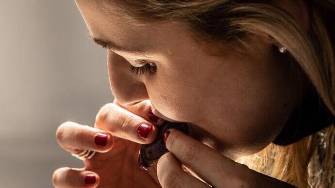 Close up of woman eating food