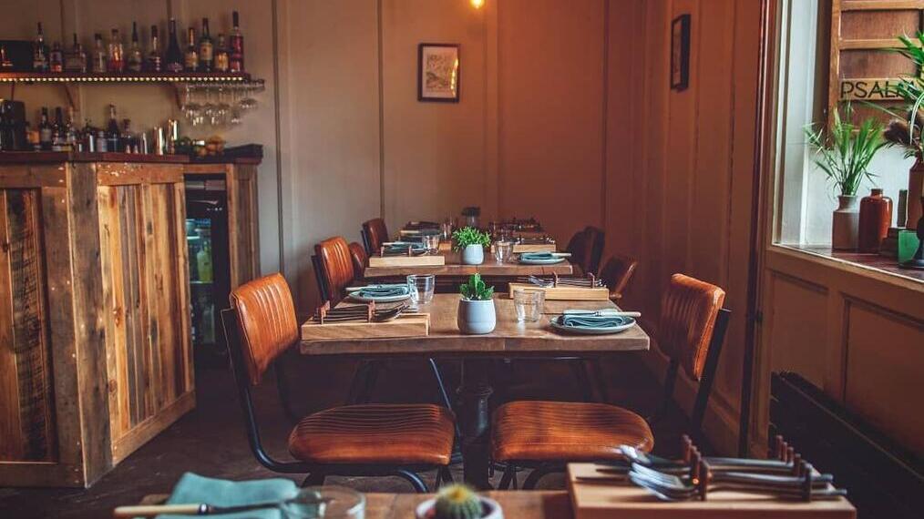 A row of tables at Chapters, a restaurant in Hay-on-Wye