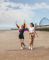 Two women having fun on Blackpool beach