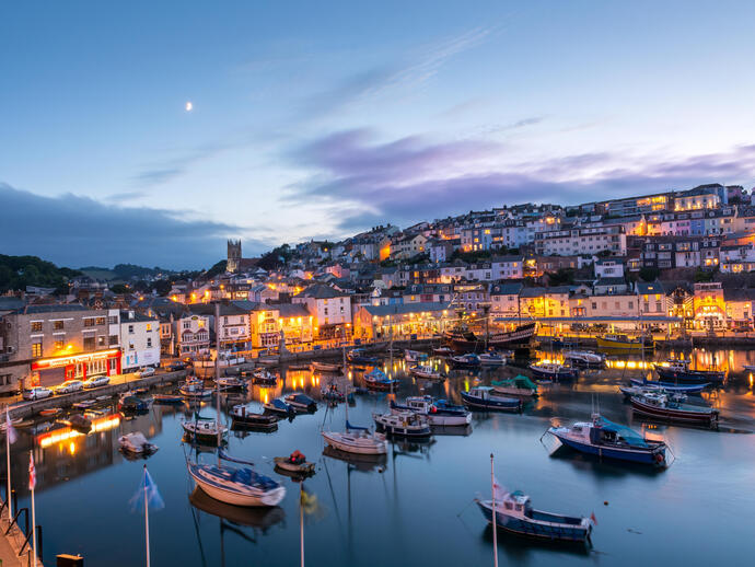 A beautiful evening dusk view over a quaint English village and harbour