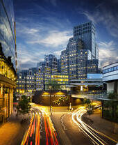 Tall buildings with bright lights in long exposure