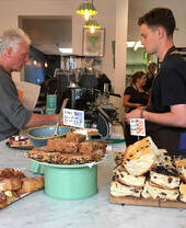 Cakes and pastries on sale at a café in Bristol