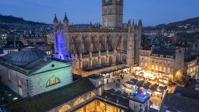 A cathedral, a market and a historic spa lit up at night