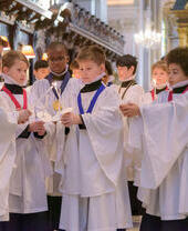 St Paul's Choristers lighting candles at Christmas